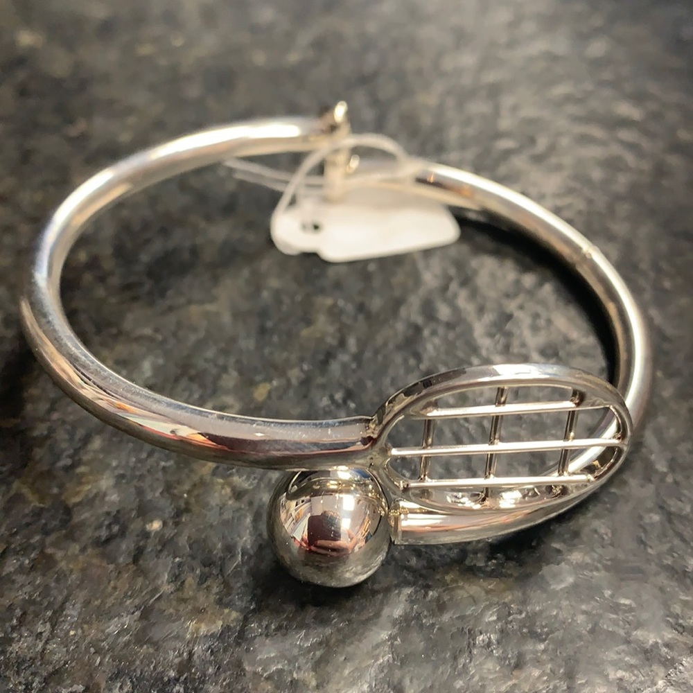 Sterling silver bangle with tennis racquet